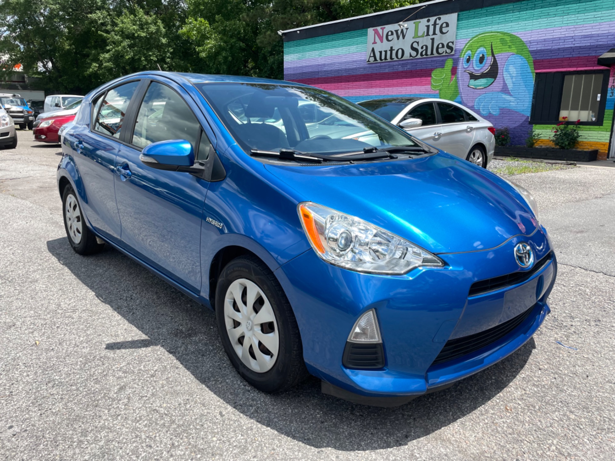 photo of 2013 TOYOTA PRIUS C - Perfect for the Fuel Conscience Driver! Certified ONE OWNER!!